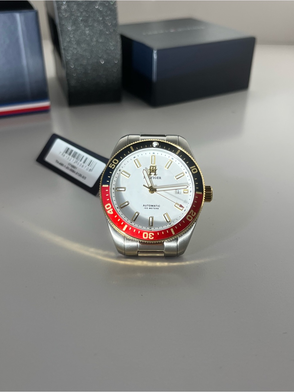 Tommy Hilfiger Silver Dial Men’s Watch with Red and Black Bezel